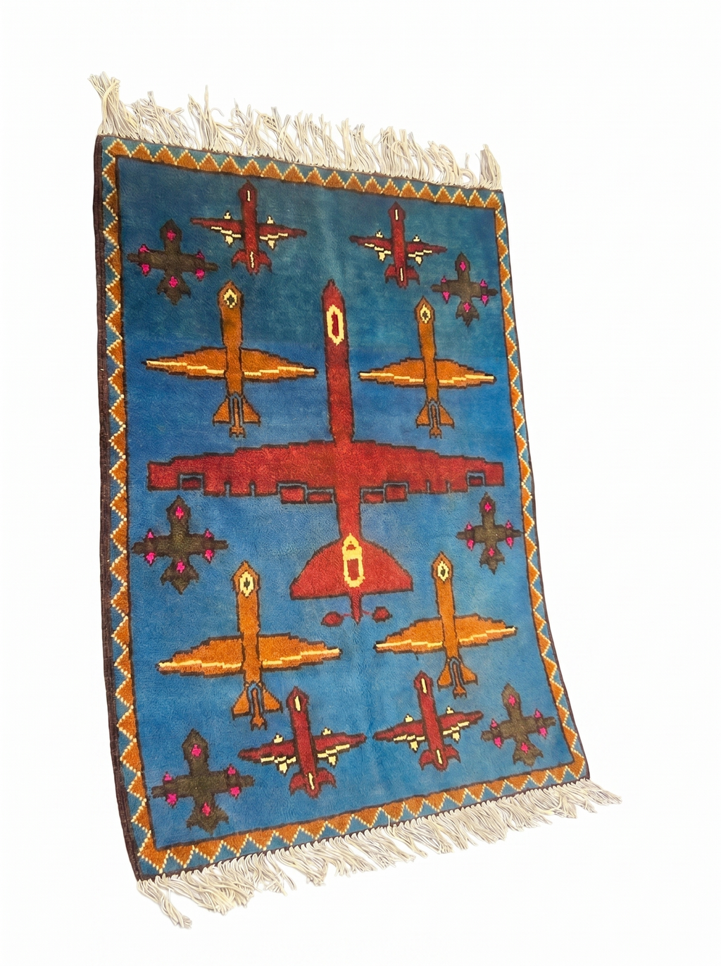 Drone Afghan war rug detail showing handmade wool weave and aircraft motifs