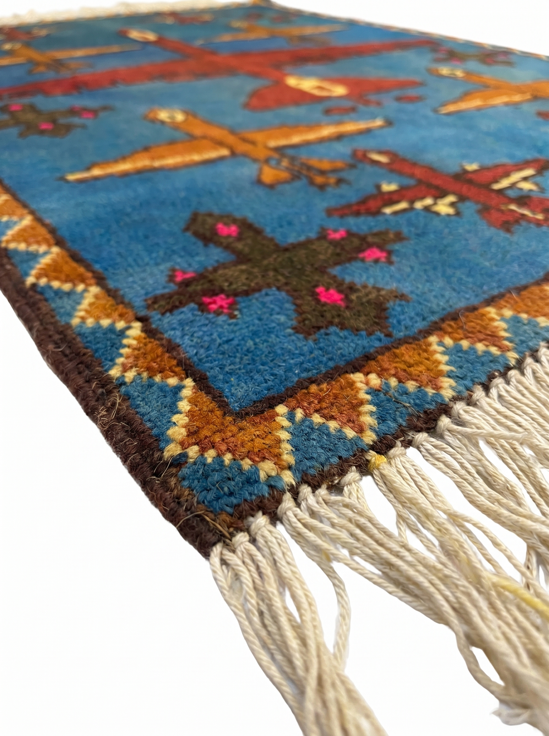 Handwoven Afghan war rug featuring drone and military aircraft designs
