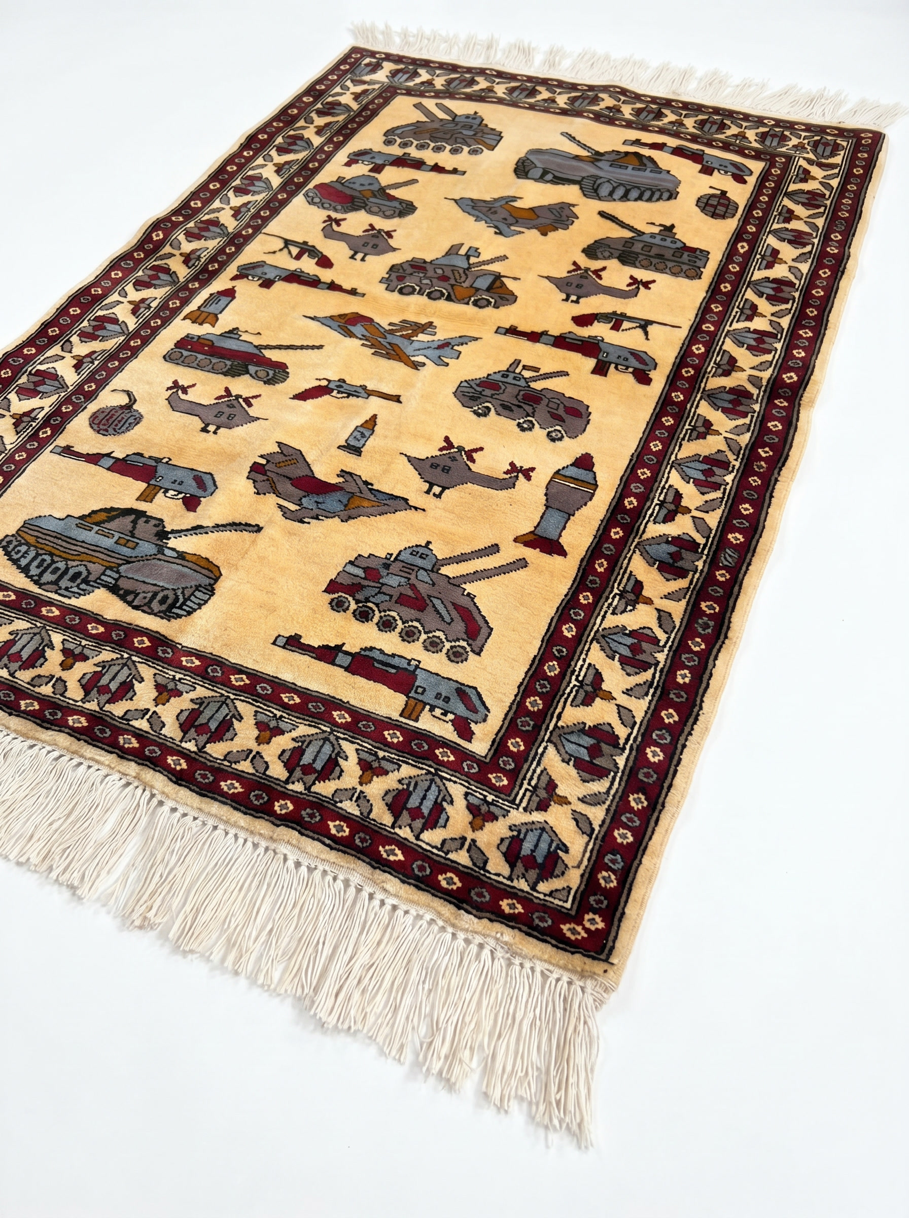 Soviet–Afghan war rug with tanks, helicopters, and military vehicles handwoven