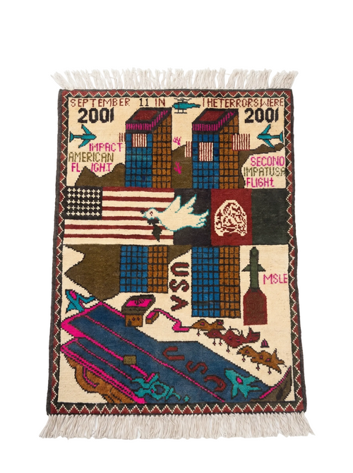 9/11 commemoration Afghan war rug with traditional tribal border patterns